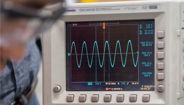 Person using a function generator
